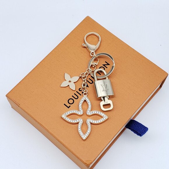 Authentic Louis Vuitton Gold Lock & Box w/ Unbranded Clover Bagcharm - Picture 1 of 9